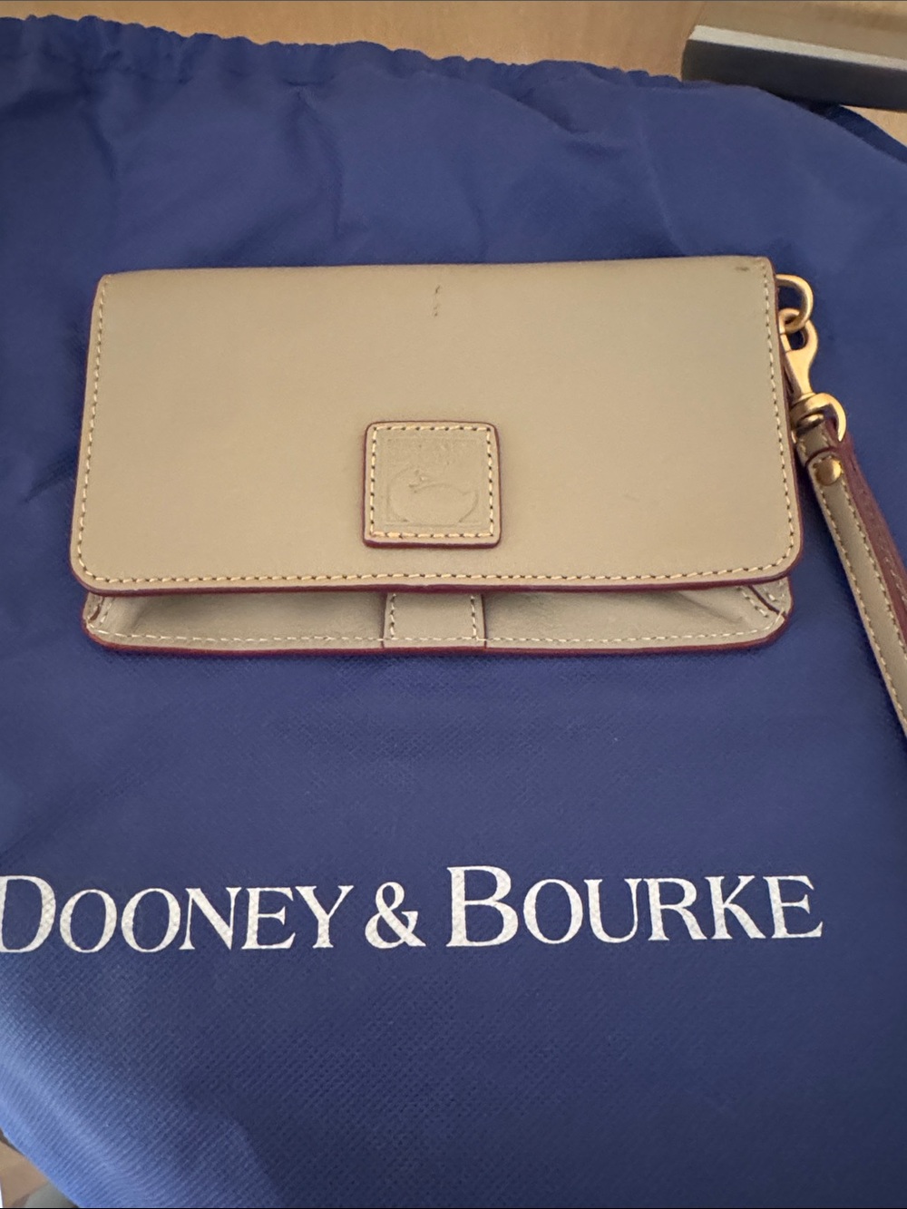 Dooney & Bourke Cream Leather Wristlet with Gold Hardware